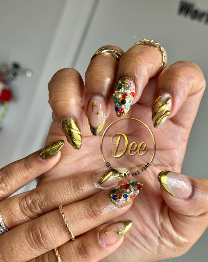 Gold and jeweled custom nail design by Nails by Dee